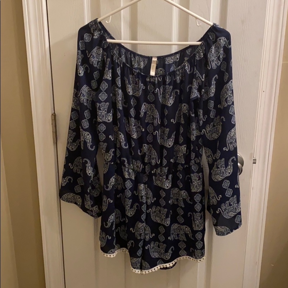 Blue romper with elephant pattern